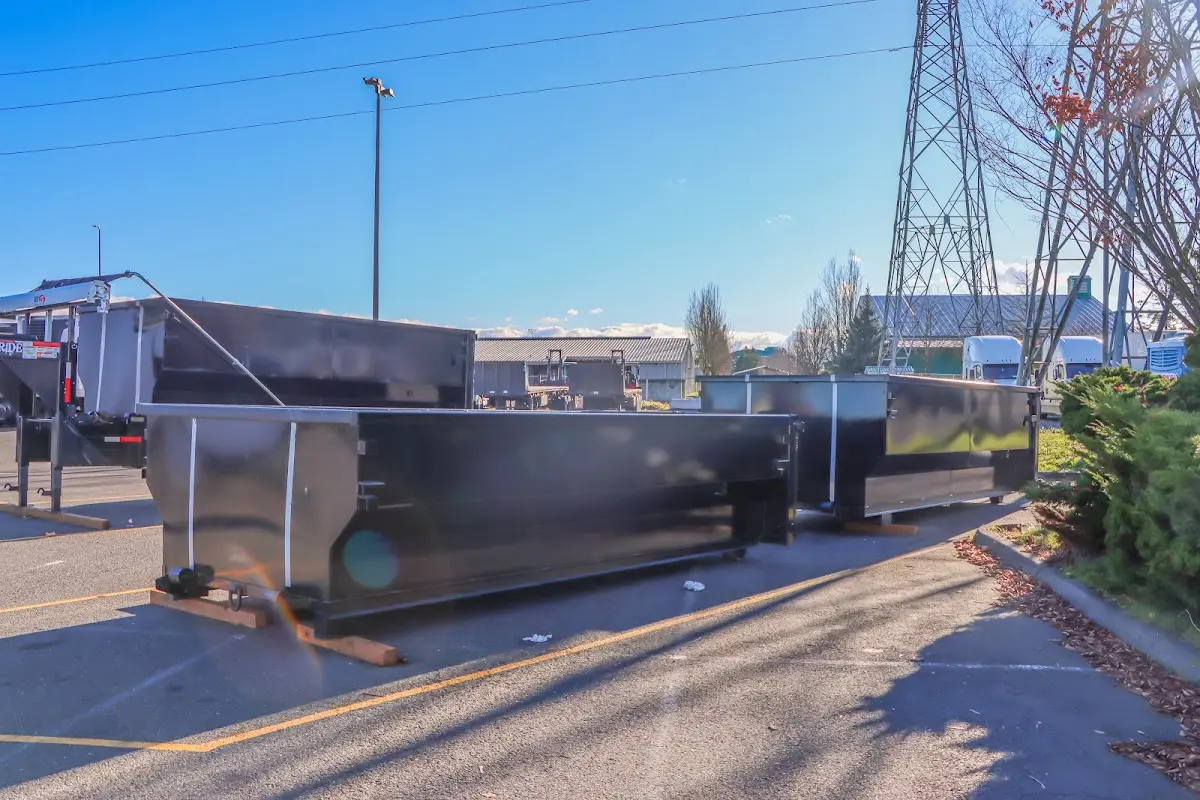 Roll-off dumpster ready for waste disposal at job site for 15 Yard Dumpster Rental in Alice